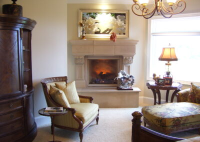 new fireplace construction in living room with stone surround and mantel