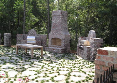 outdoor fireplace with stone surround