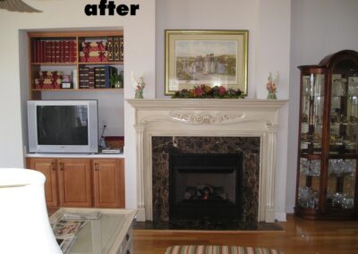 new fireplace construction after with white wood surround and mantel