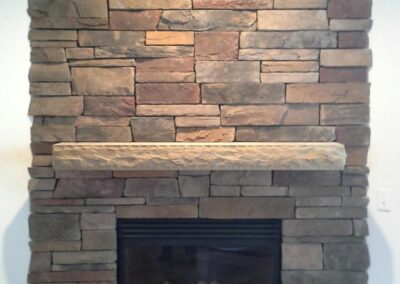 new gas fireplace in living room with brick surround