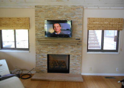 new fireplace construction with stone surround