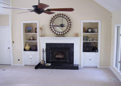 new gas fireplace in living room with white wood mantel