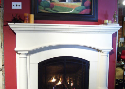 gas fireplace with white wood surround